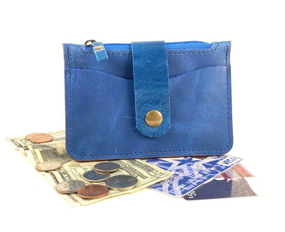 Blue leather minimalist wallet for cards and cash.