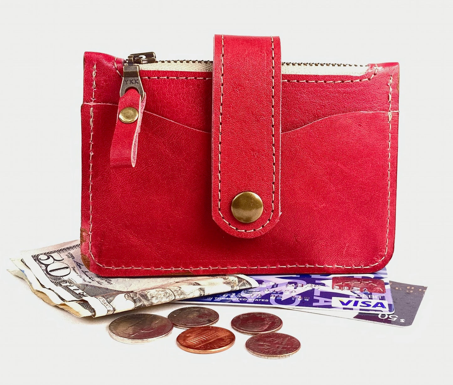 Leather wallet in red for cards and cash in minimalist design handcrafted in USA.
