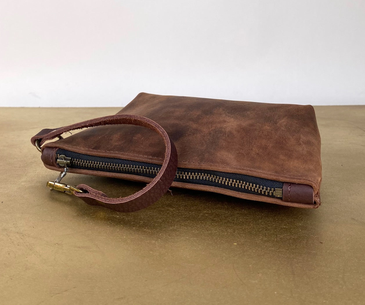 Tagalong Clutch in Dark Brown Leather
