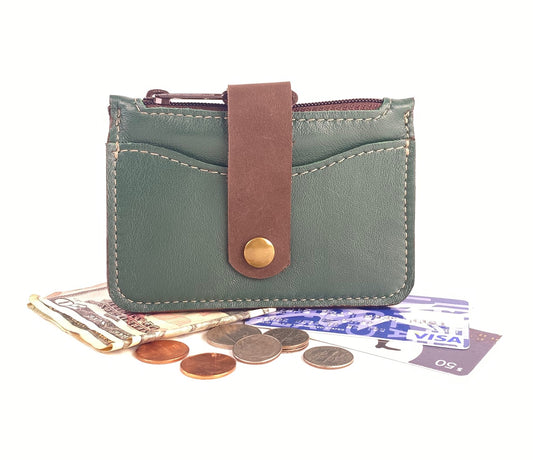 Leather card wallet with zipper pocket in minimalist compact design.